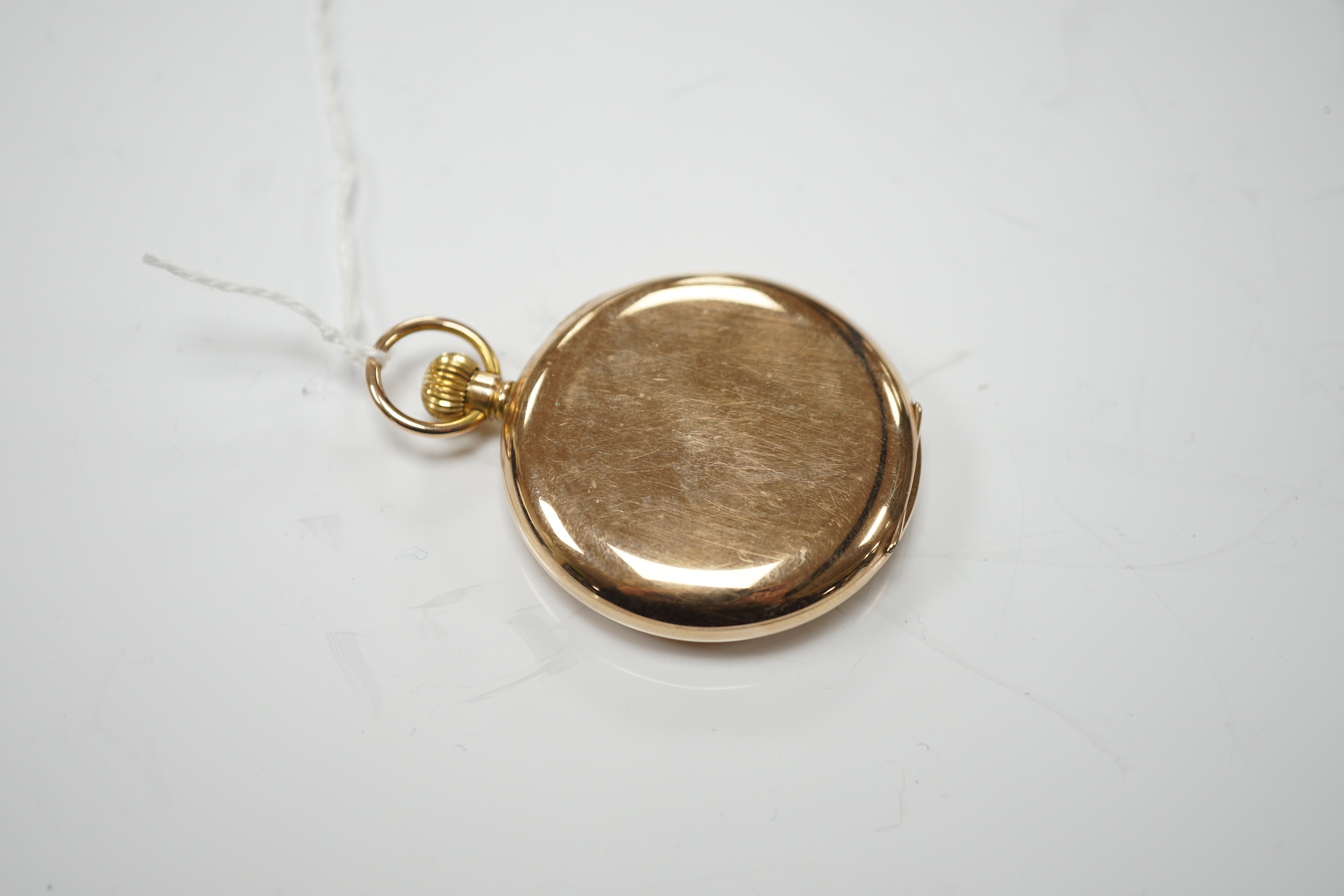 An early 20th century 9ct gold open face pocket watch, retailed by Spiegelhalter Bros, with Arabic dial and subsidiary seconds, case diameter 47mm, gross weight 61.2 grams.